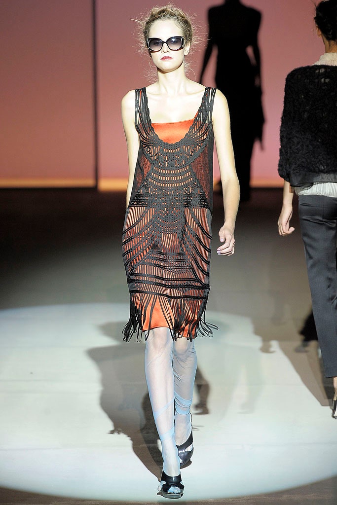 black and orange fringed mini dress