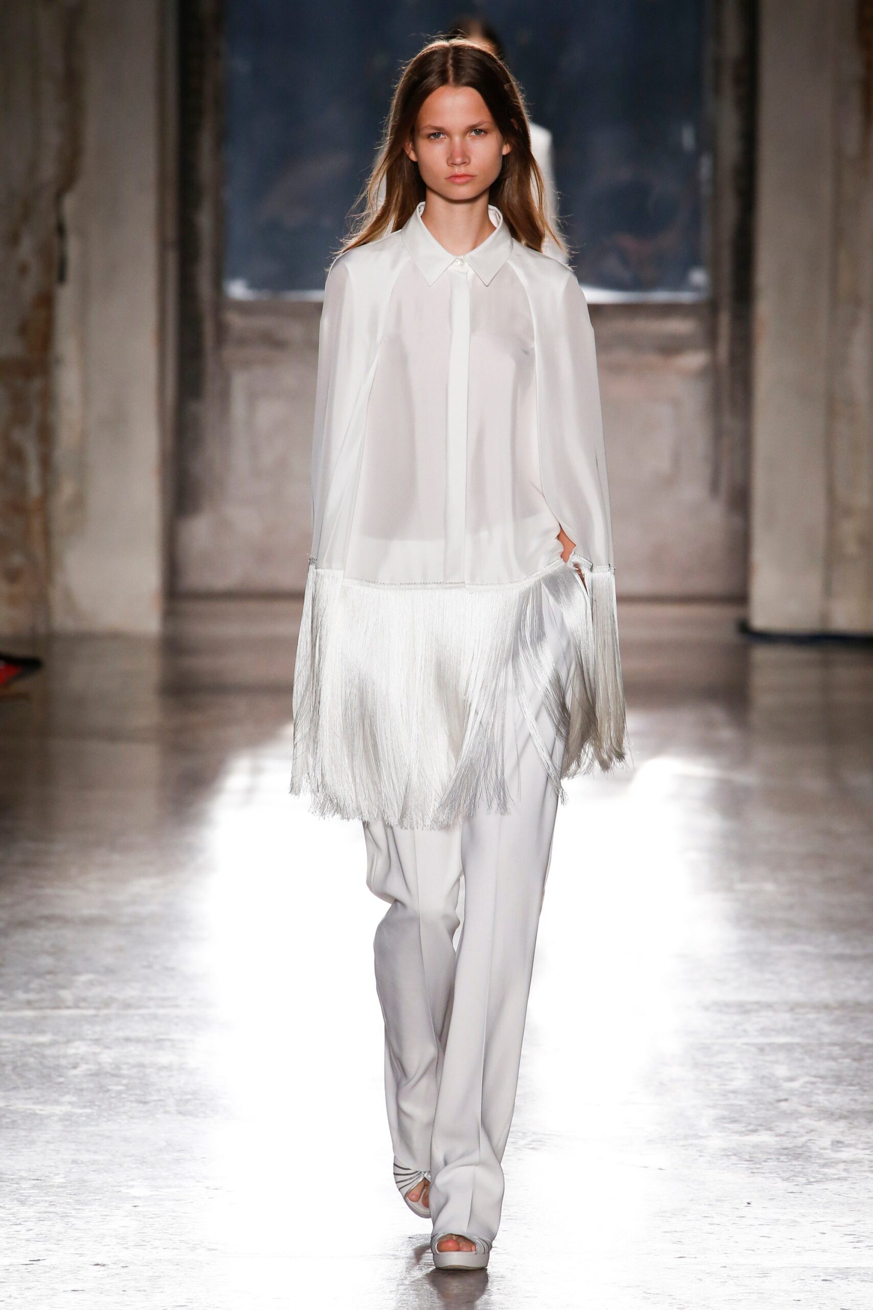 white silk long-sleeve collared relaxed fringed flowing blouse