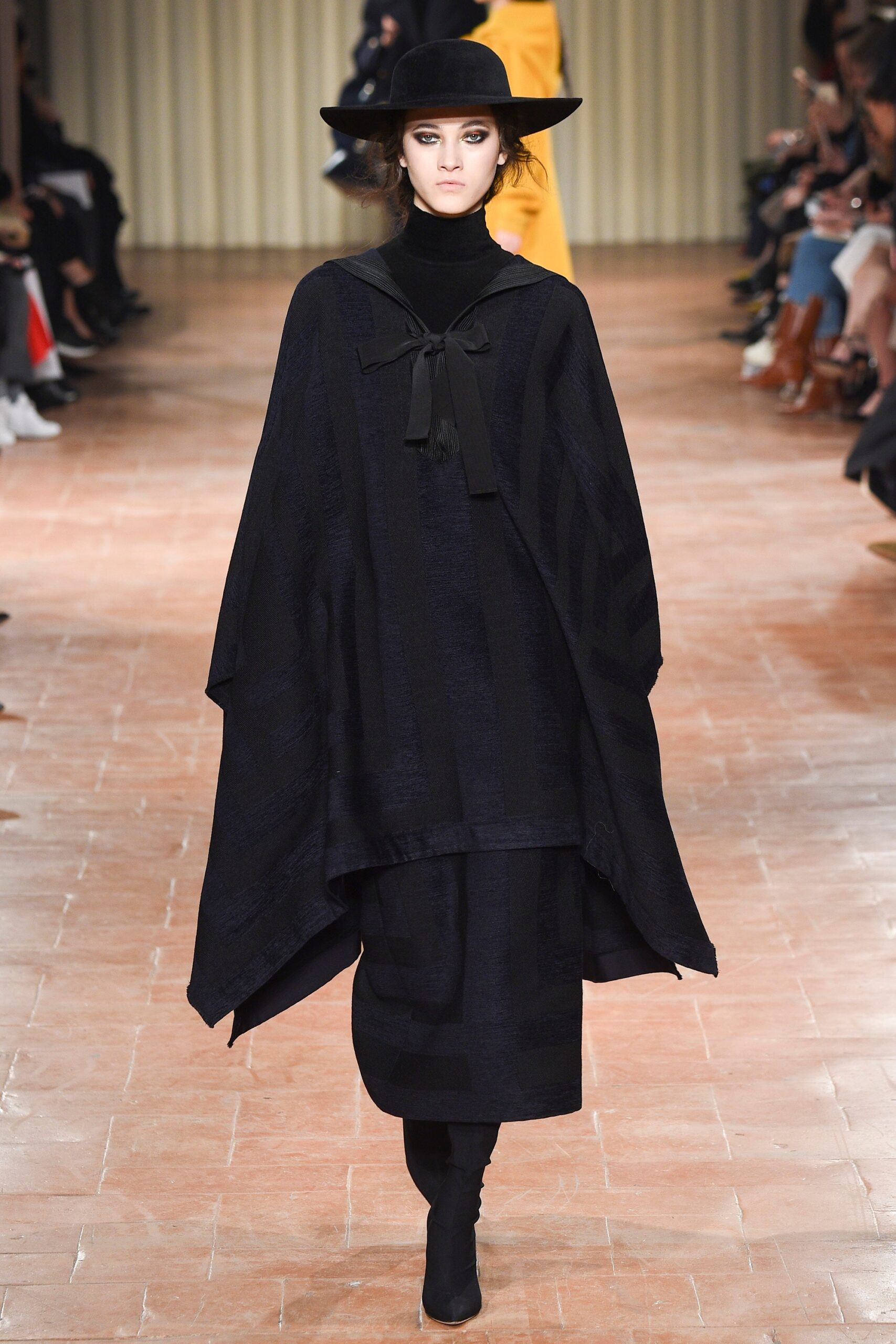 black wool sleeveless high-neck relaxed layered poncho