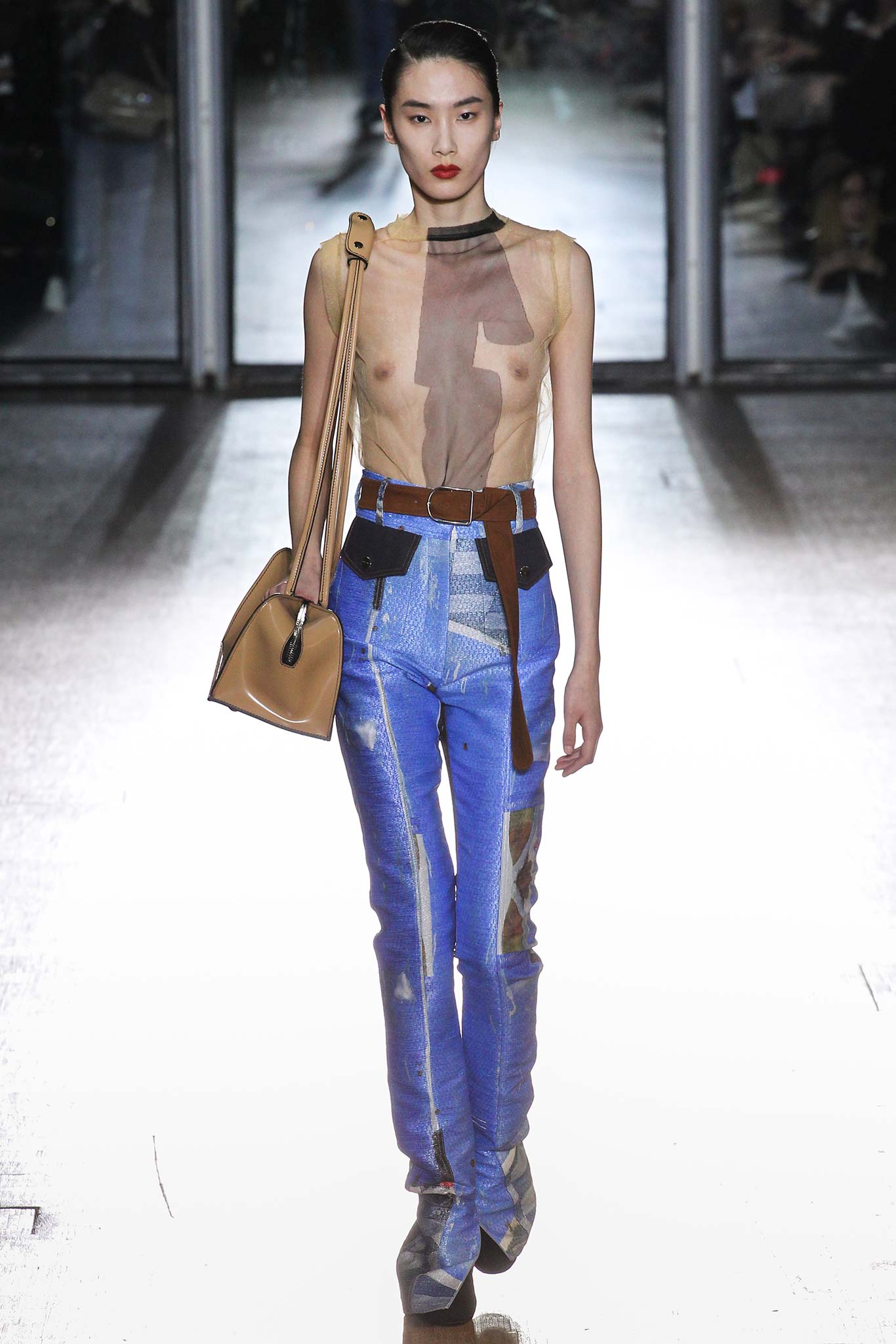 sheer beige top and blue pants