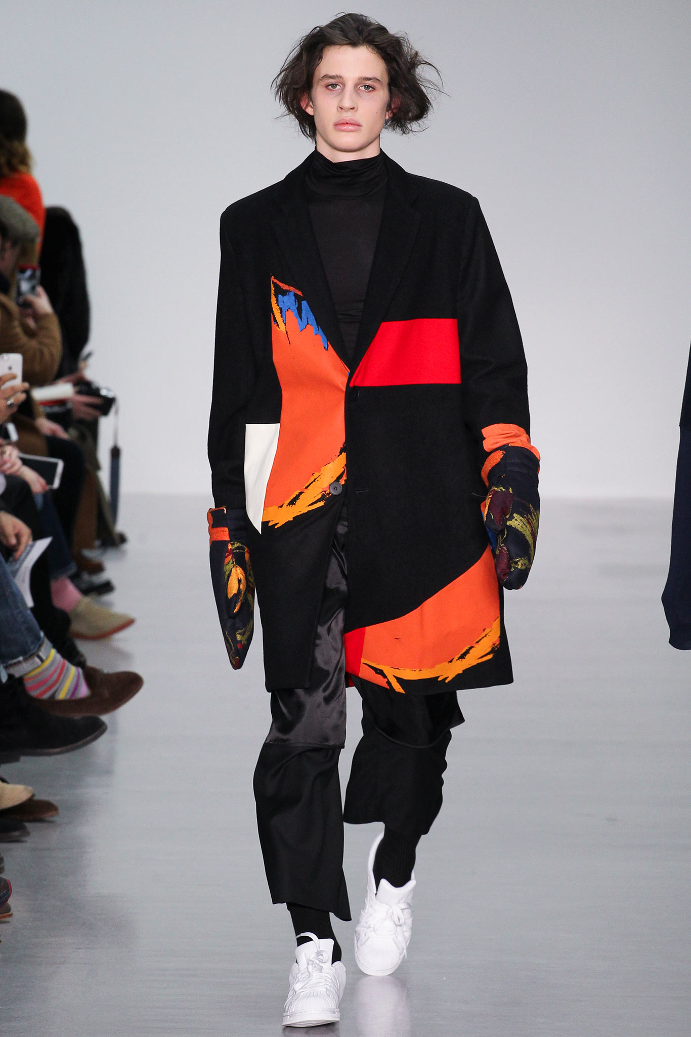 color-blocked black coat with tailored pants