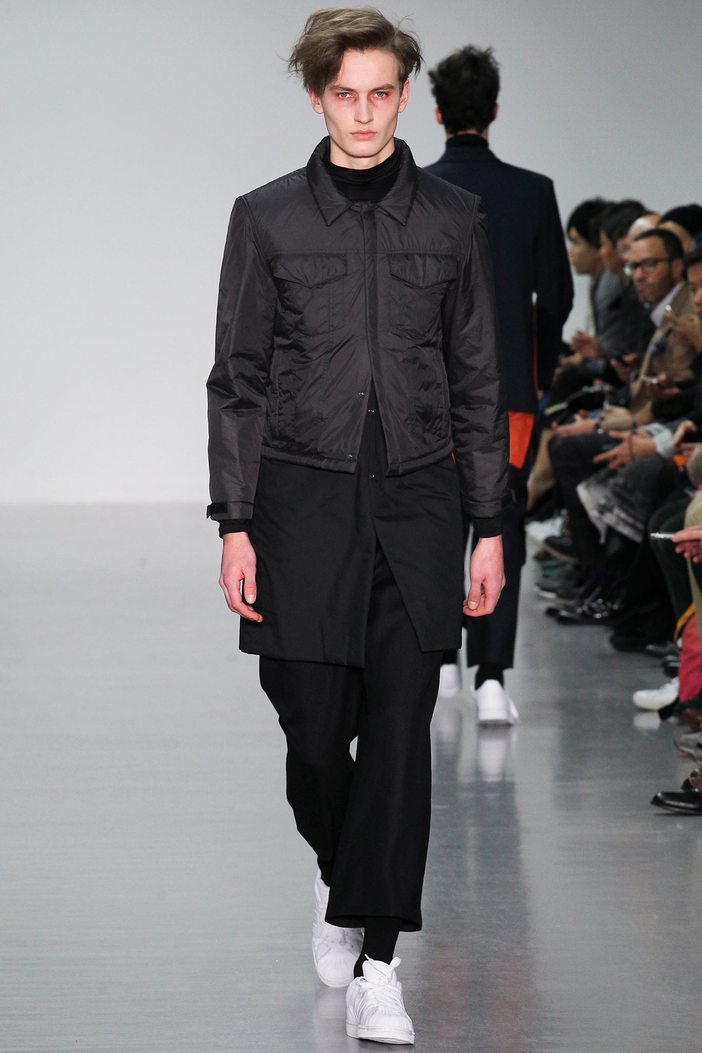 black fitted jacket and relaxed pants