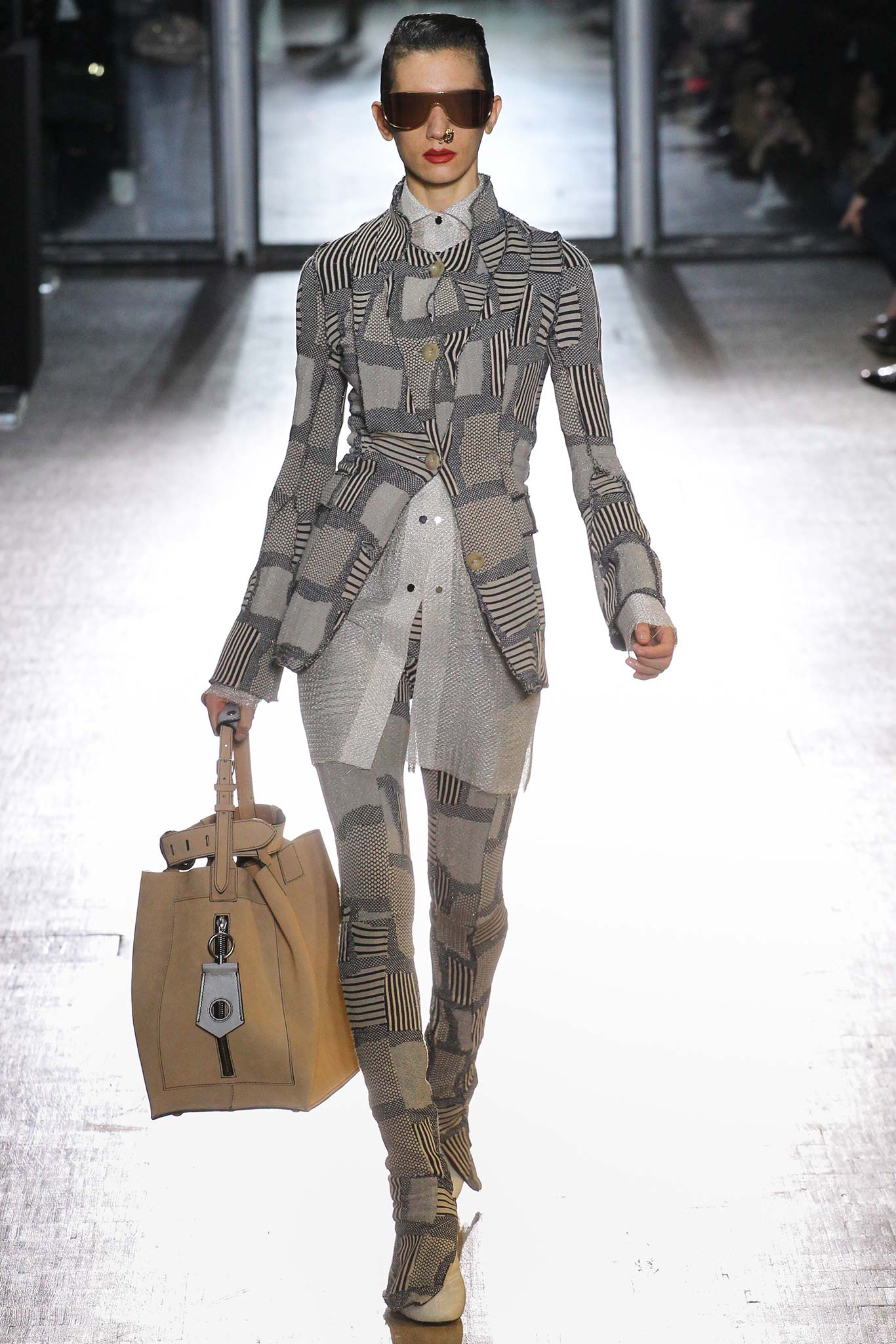 gray checked suit with bag
