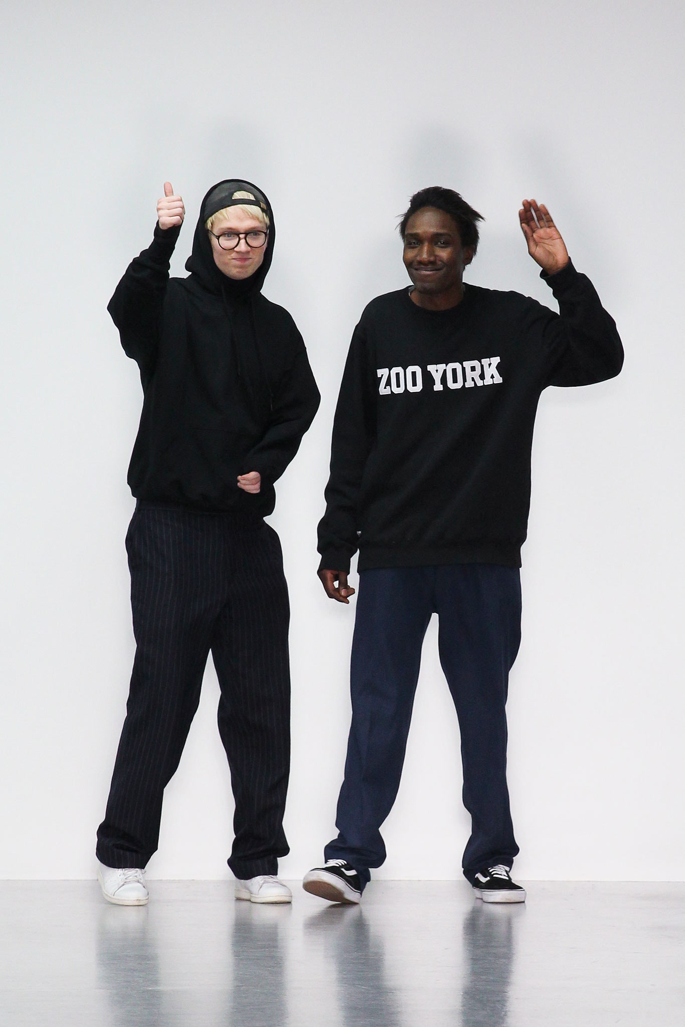 black hoodie and relaxed pants