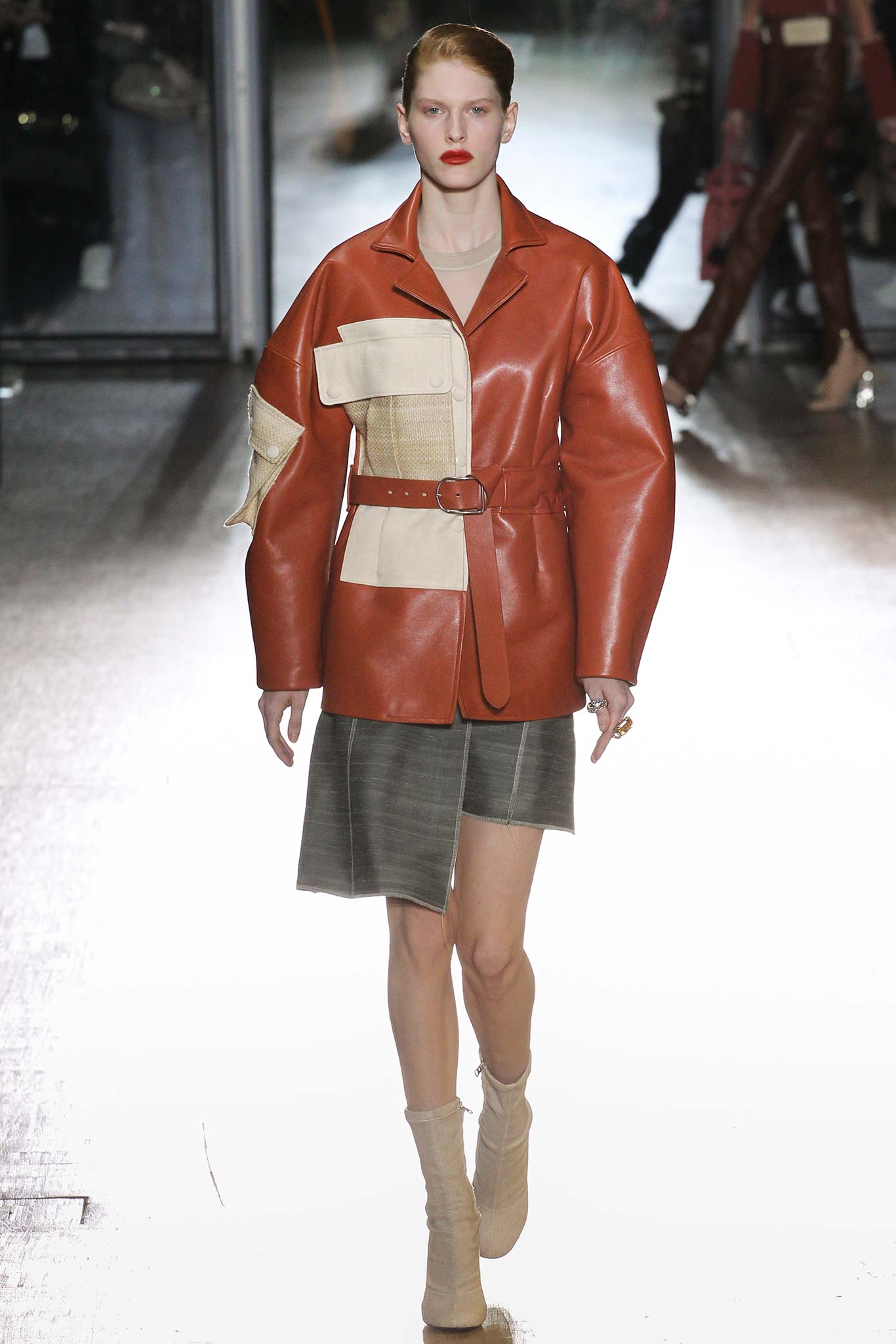 oversized red leather jacket and gray denim skirt