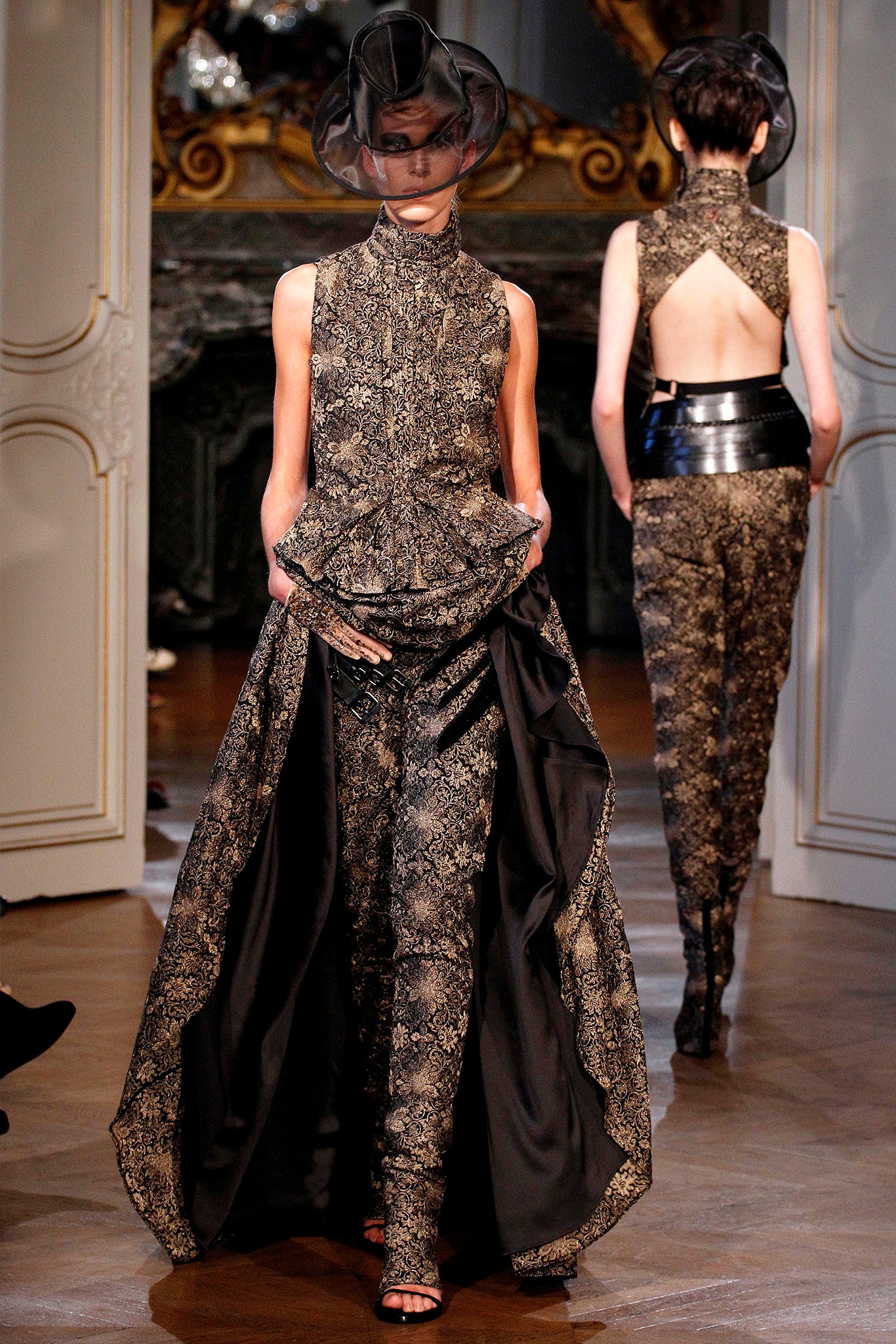 black and gold pleated gown