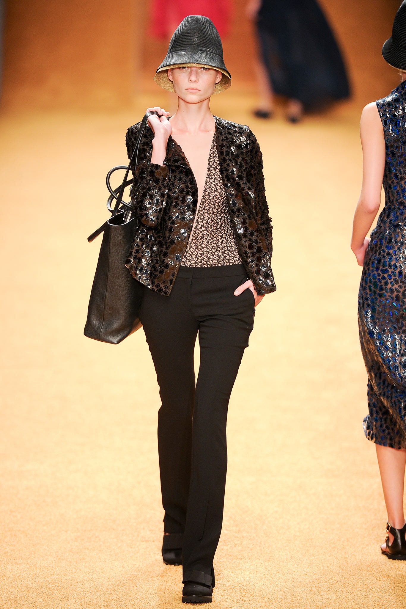 black embroidered jacket with tailored pants