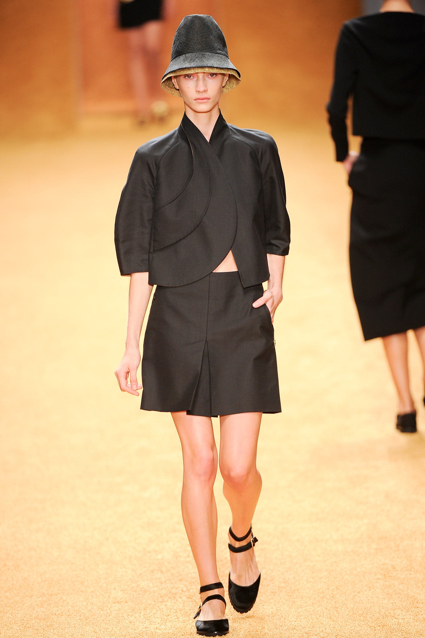 black cotton short-sleeve collared fitted draped jacket