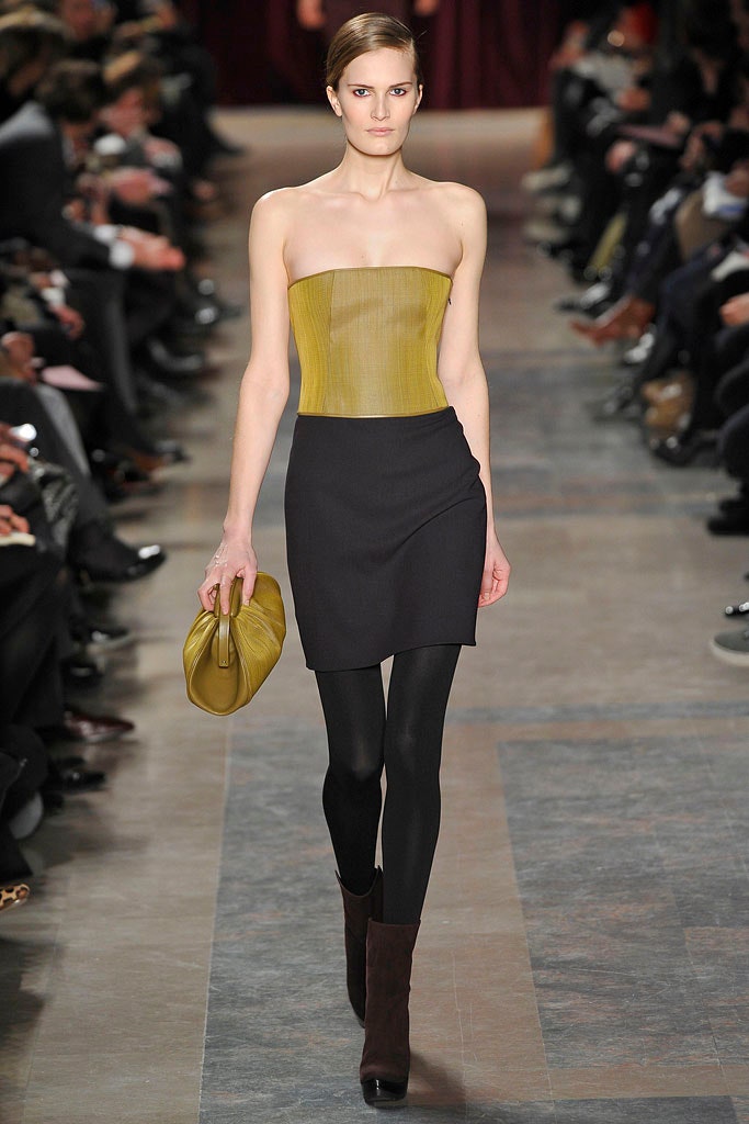 yellow strapless top with black skirt