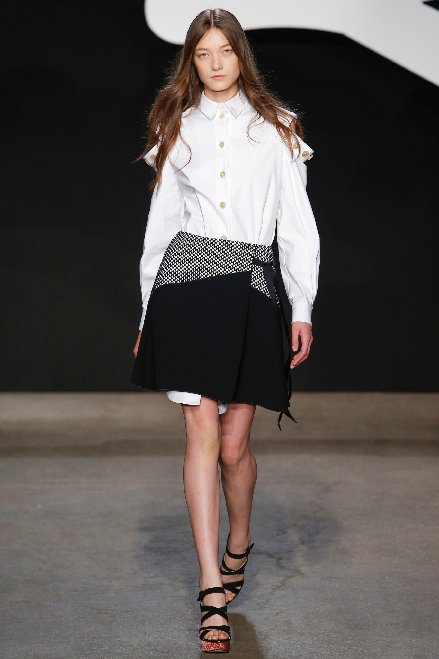 white fitted shirt and black skirt