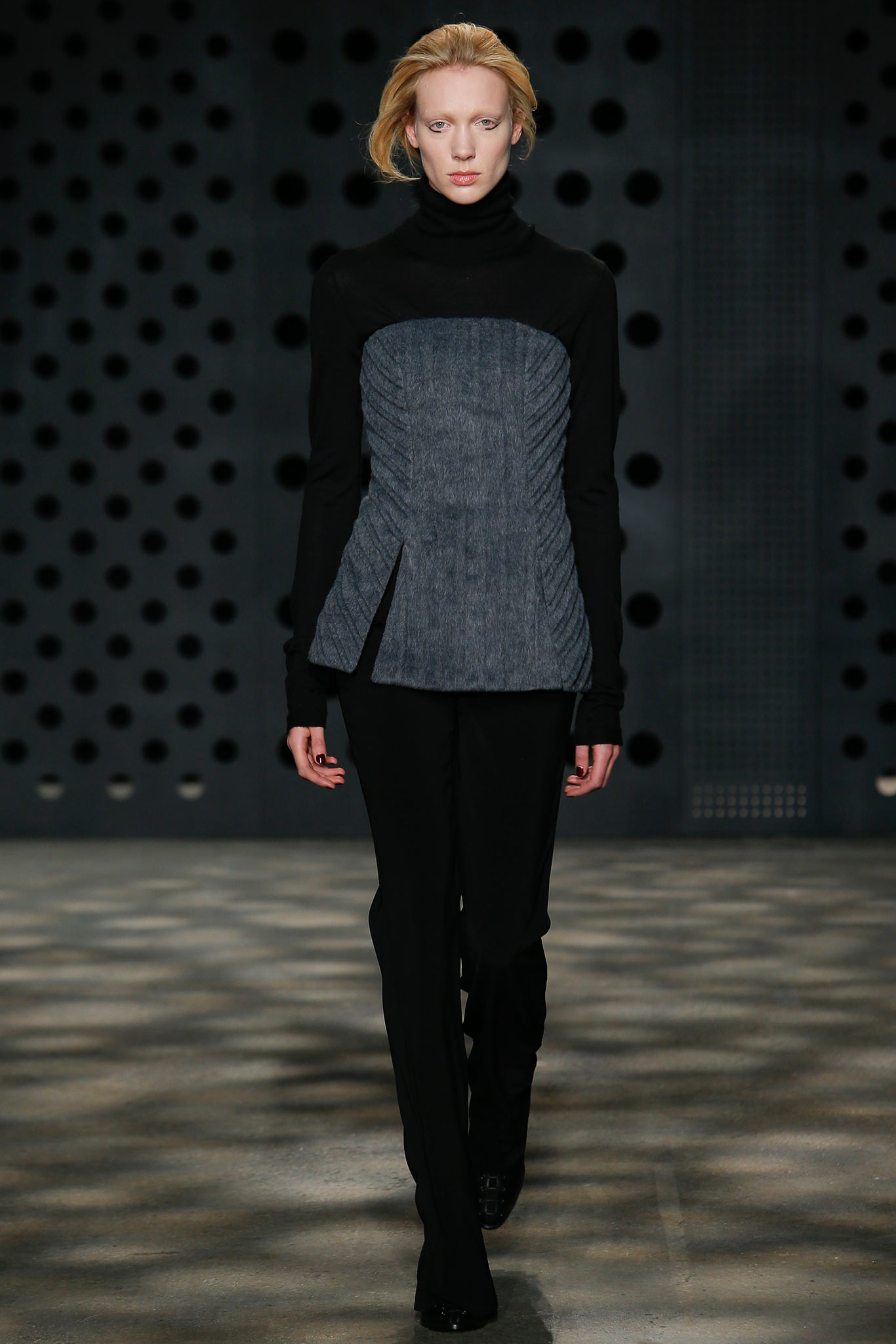 fitted black top with ruched detail