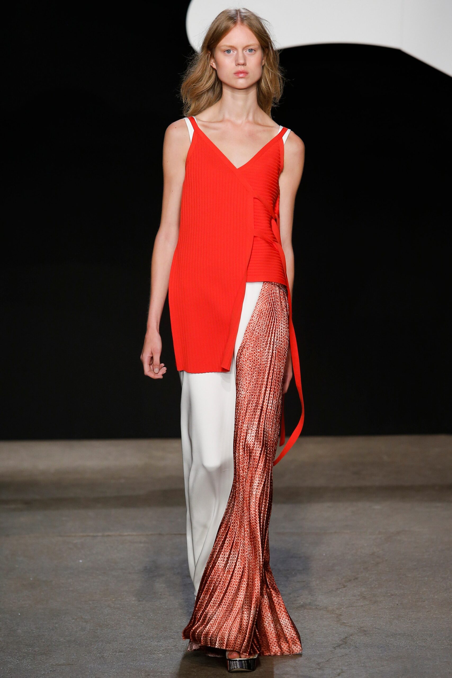 red fitted top with pleated maxi skirt