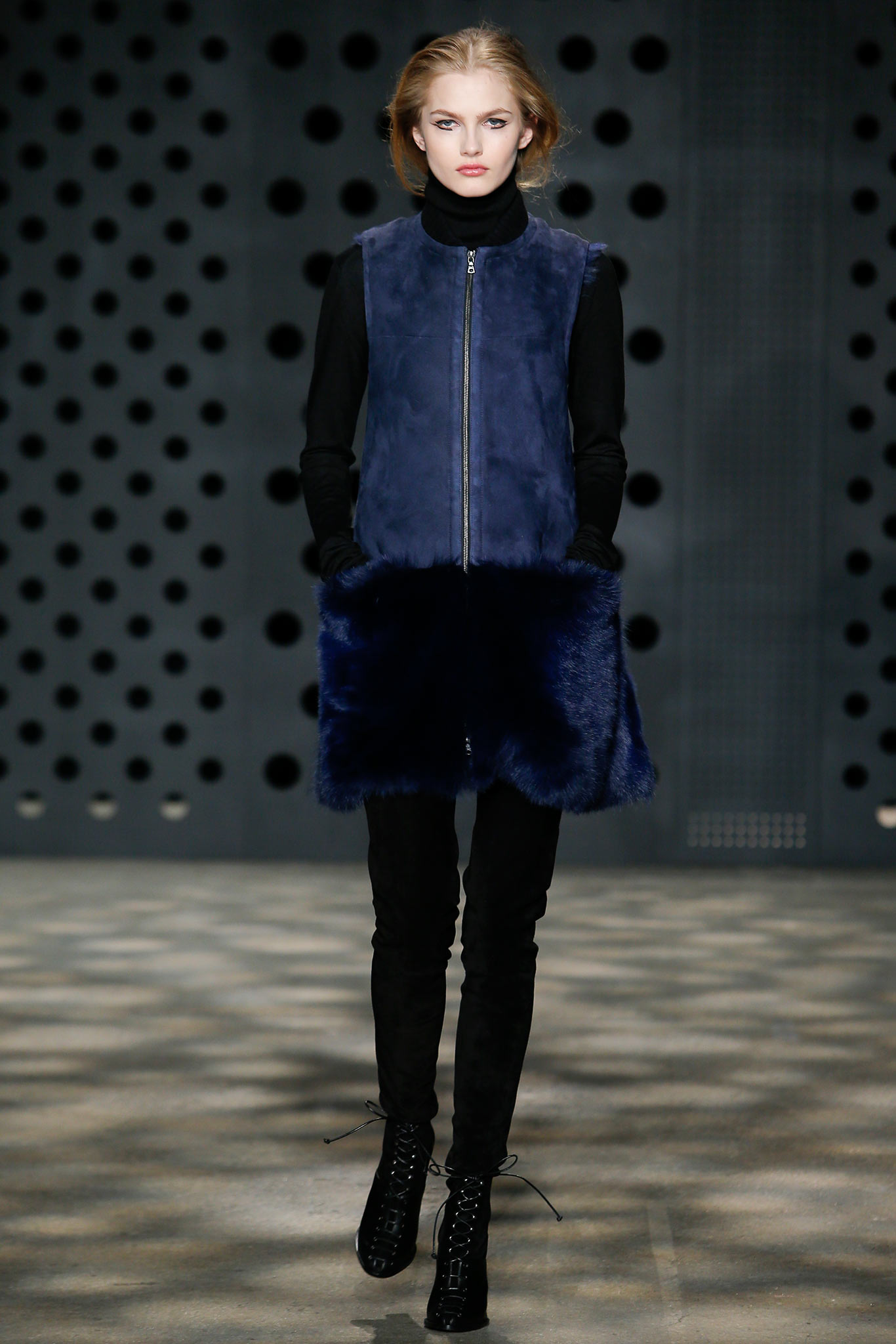 blue fur vest with black top