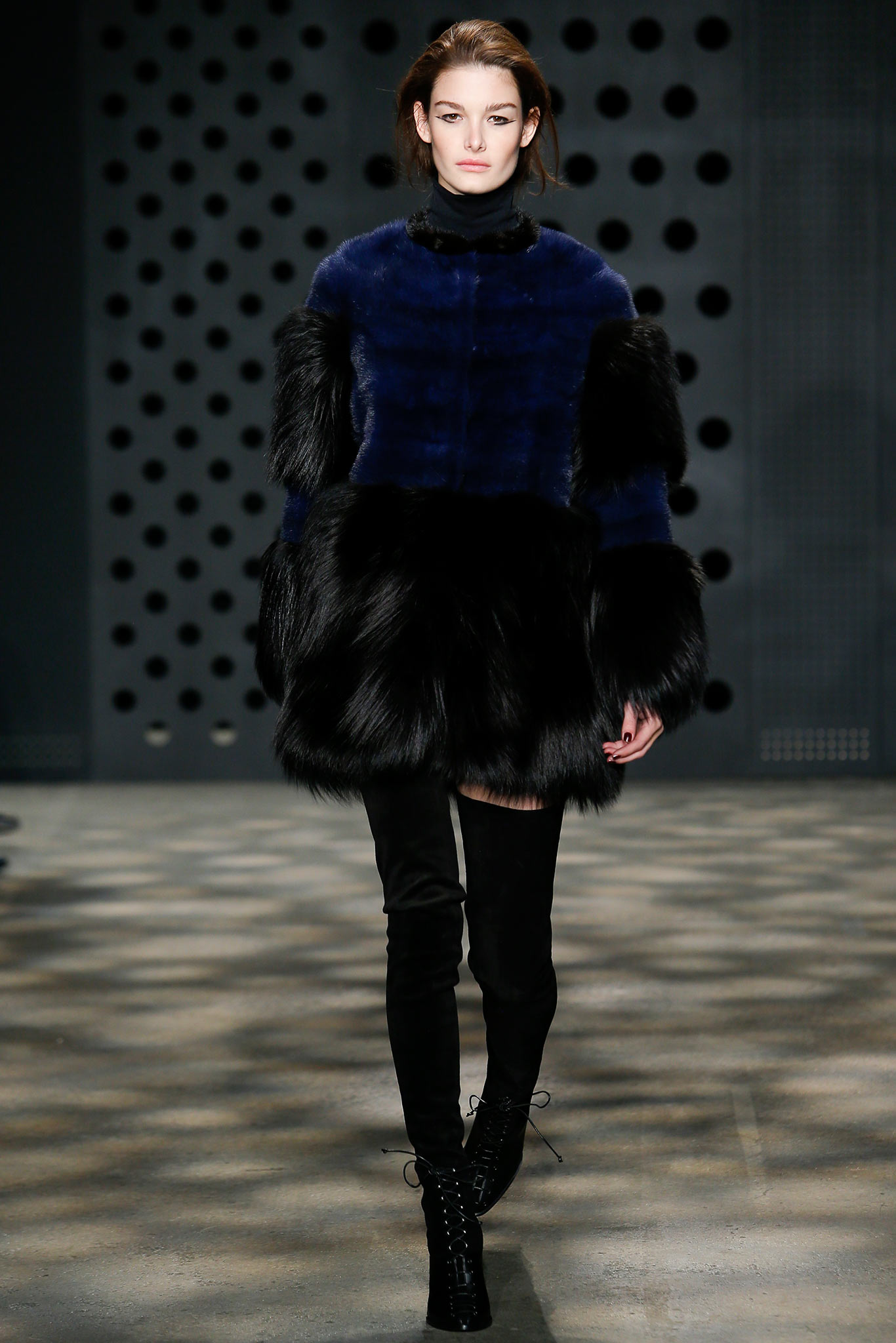 blue fur coat with black pants