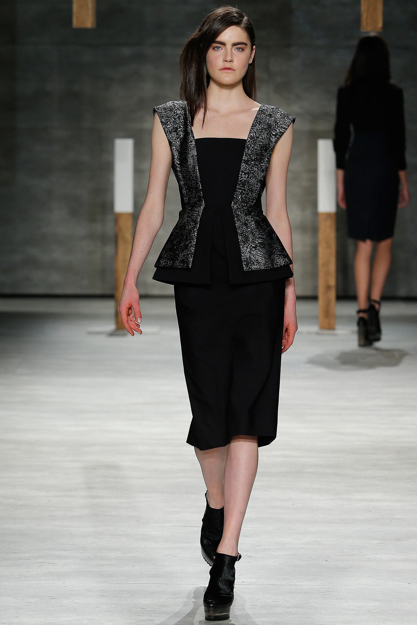 fitted black peplum top and pencil skirt