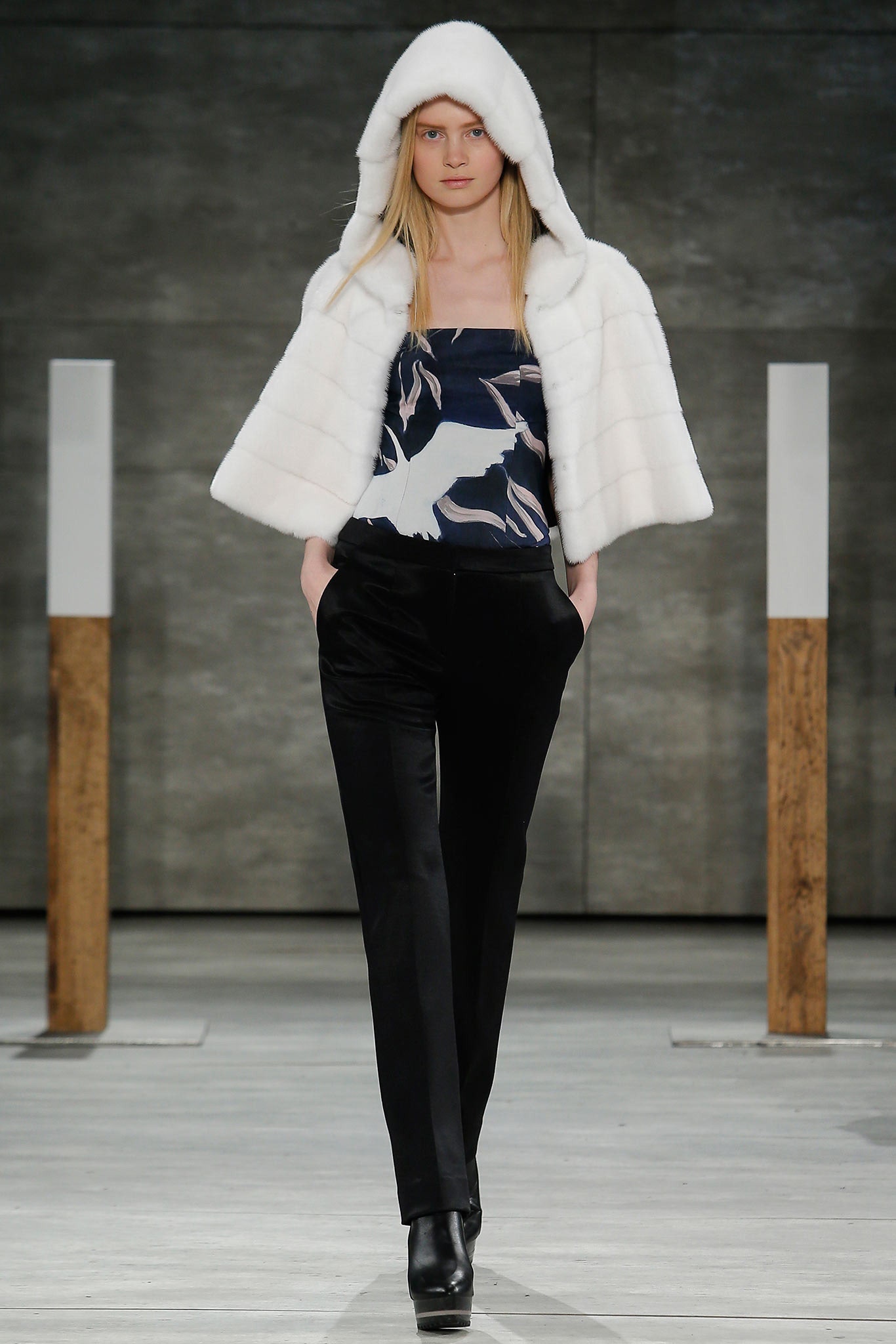 white faux-fur coat with blue top