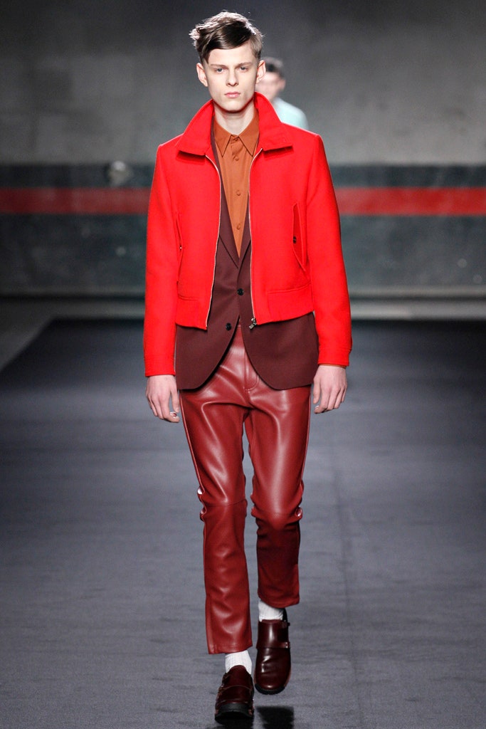red fitted jacket with brown shirt