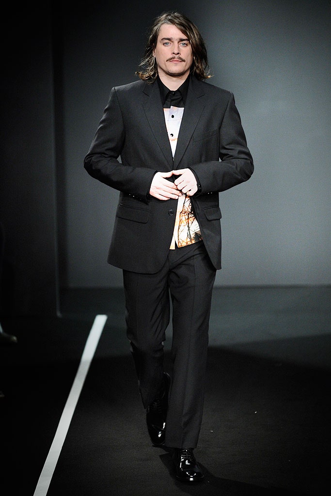 black wool long-sleeve collared tailored buttoned suit