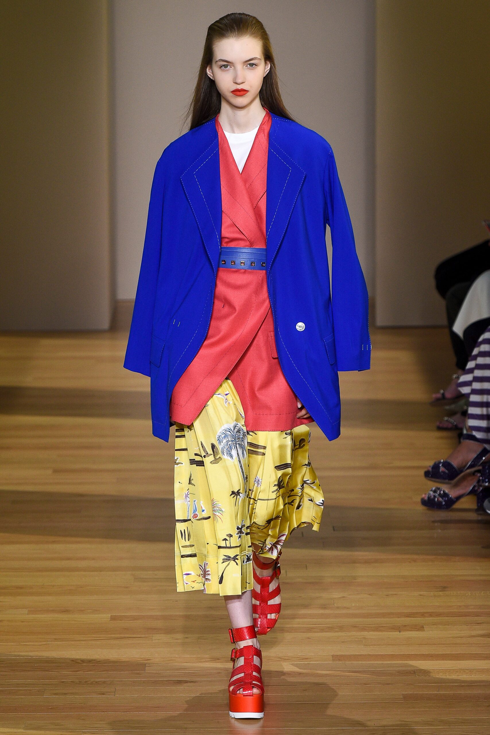 blue oversized jacket red top yellow skirt