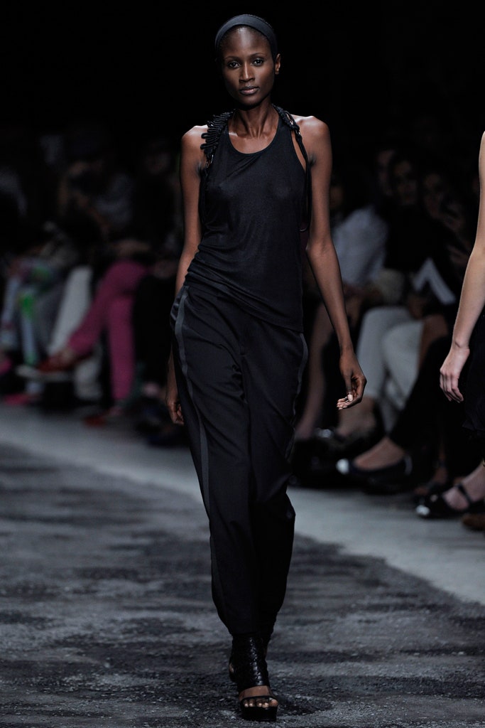 black fitted top and relaxed pants