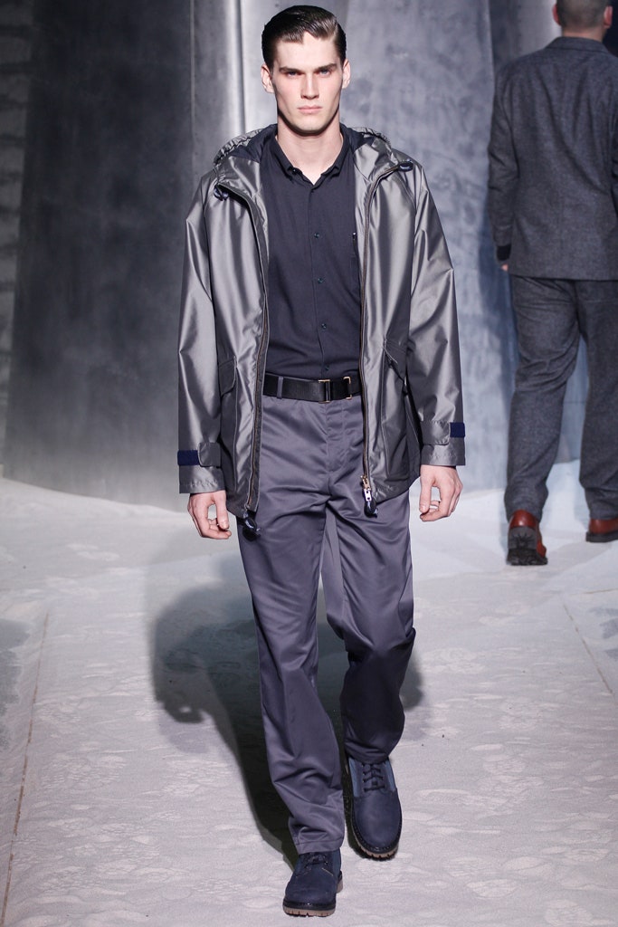 gray vinyl jacket with black shirt