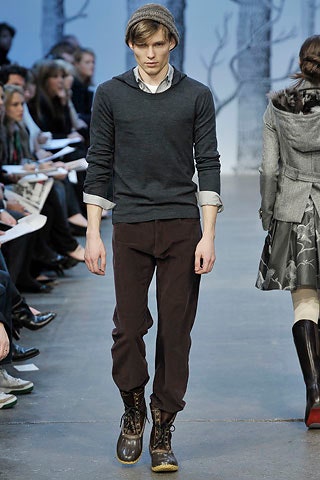 gray hooded sweater with brown pants