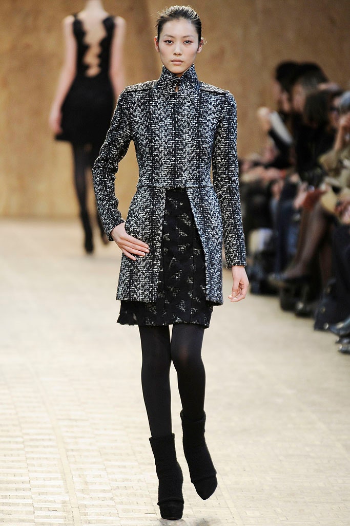 black wool long-sleeve collared fitted zippered layered coat