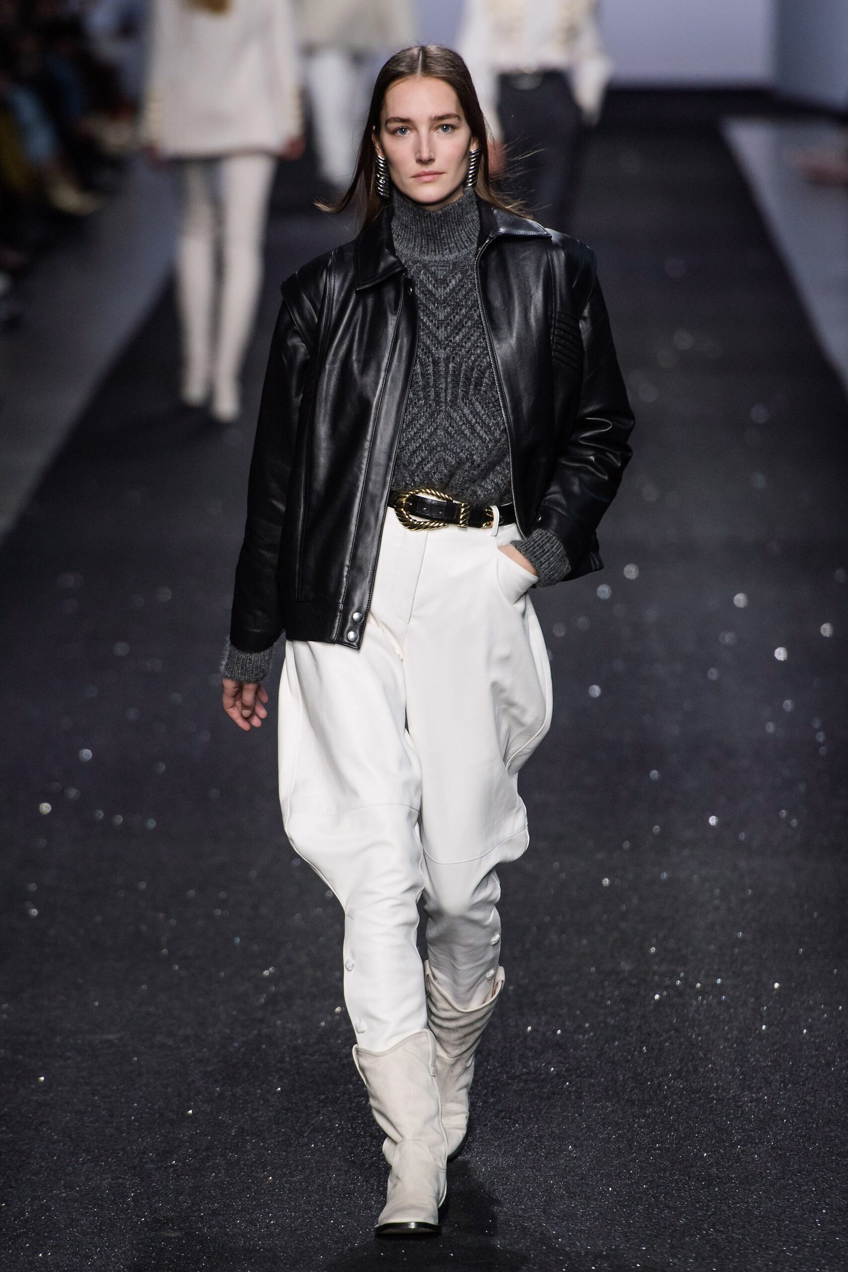 black leather jacket with gray sweater