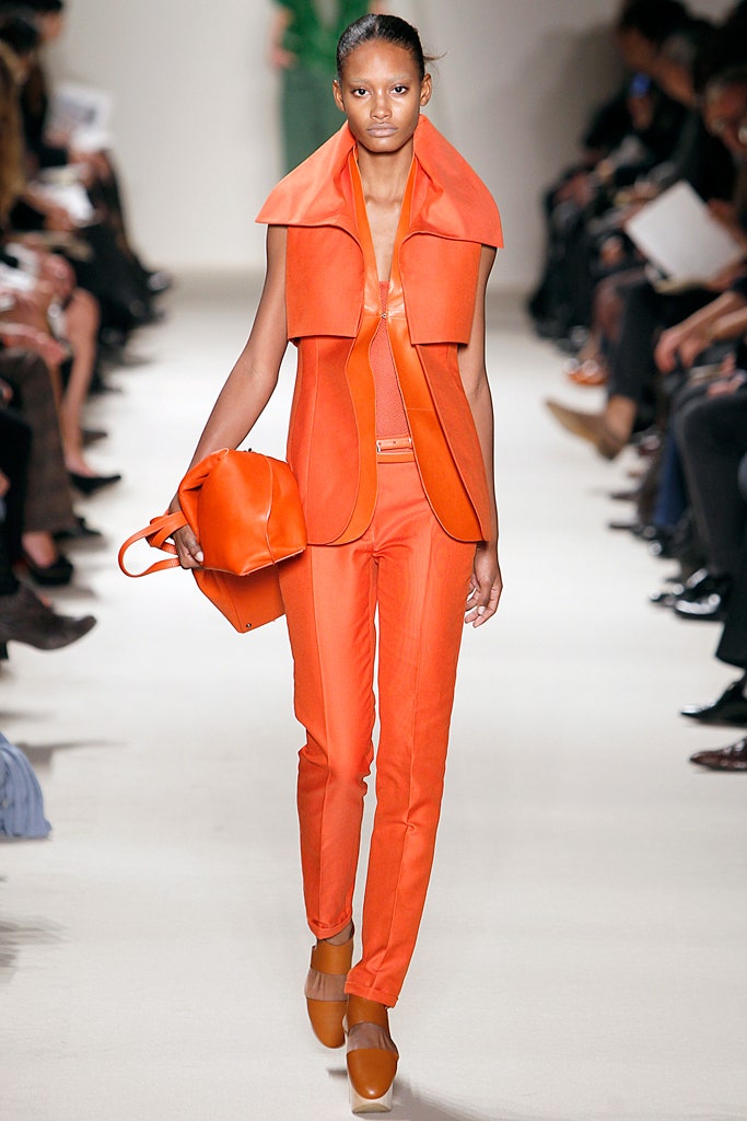 fitted orange vest and pants