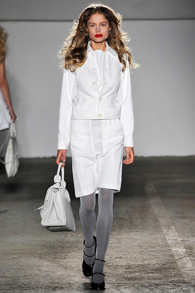 white fitted jacket and skirt