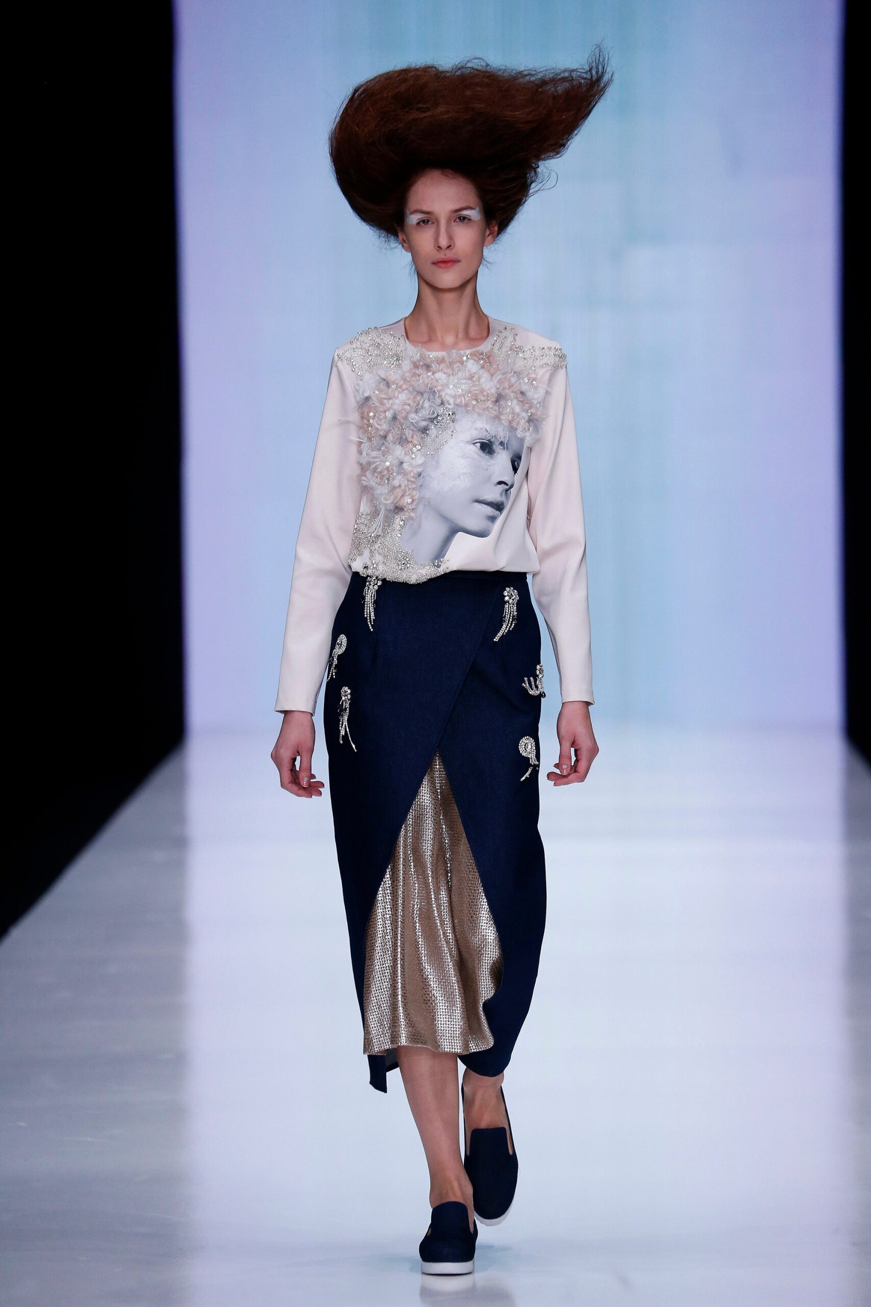 white silk embroidered top and blue denim skirt