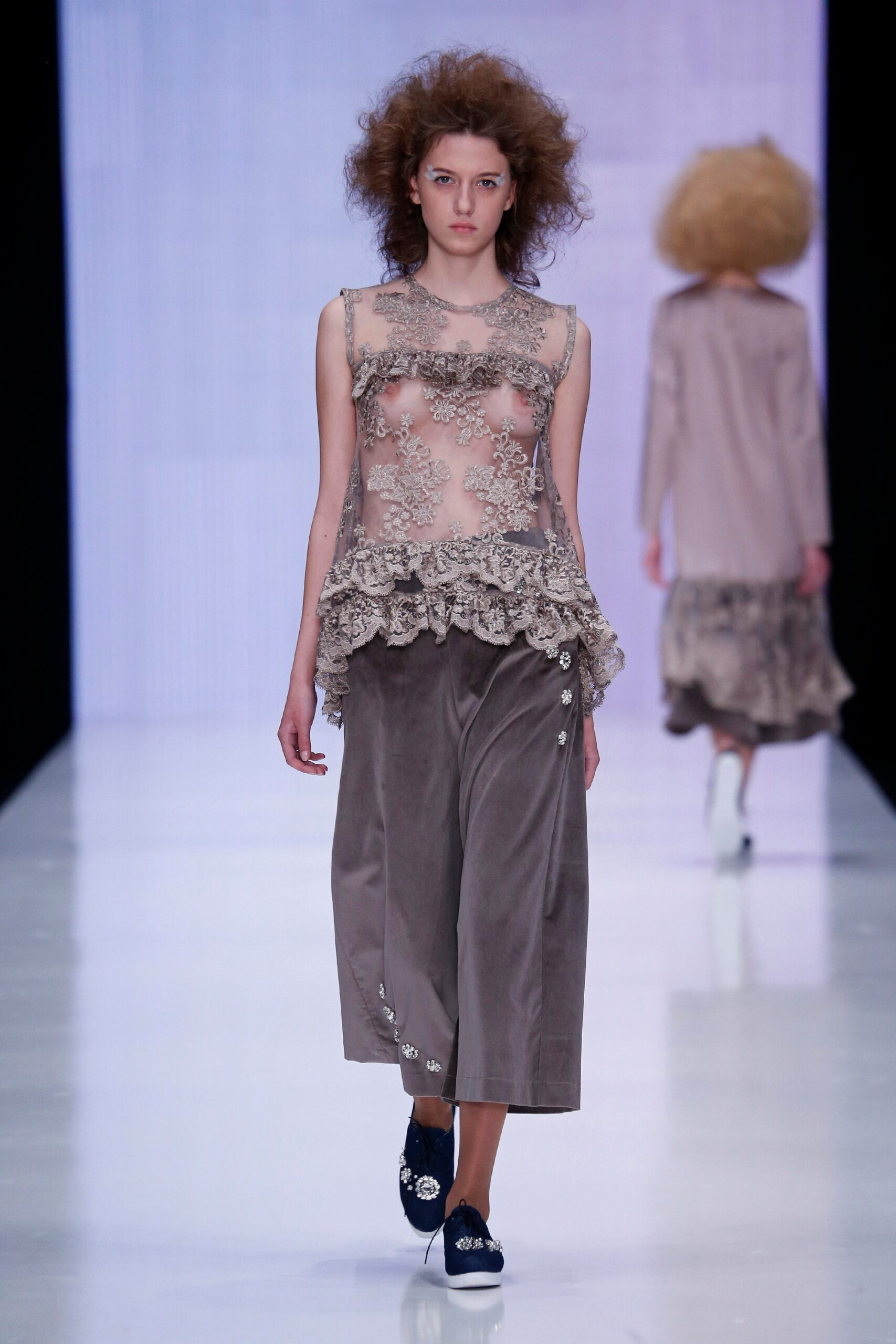 beige lace top with gray velvet pants