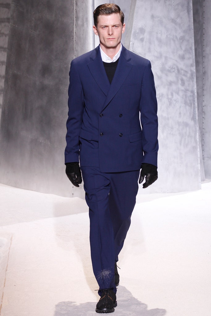 blue tailored suit with gloves