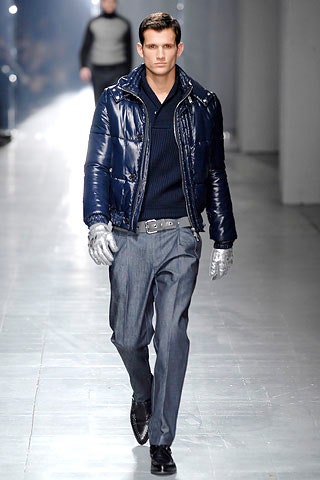 blue vinyl jacket with gray pants