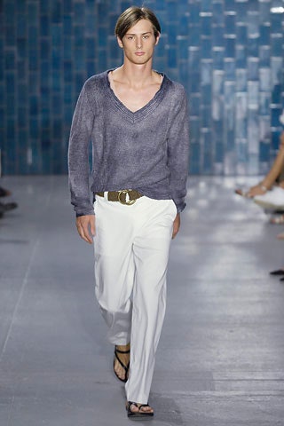 blue relaxed sweater with white pants