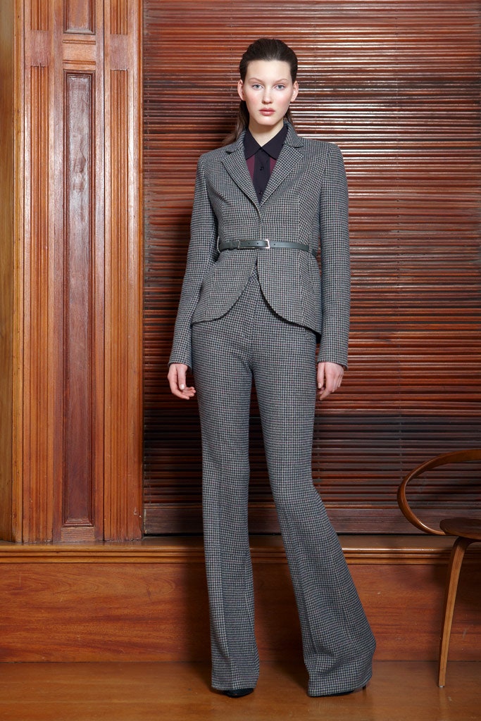 black wool long-sleeve collared tailored buttoned flared suit