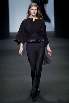 black silk relaxed top and fitted pants