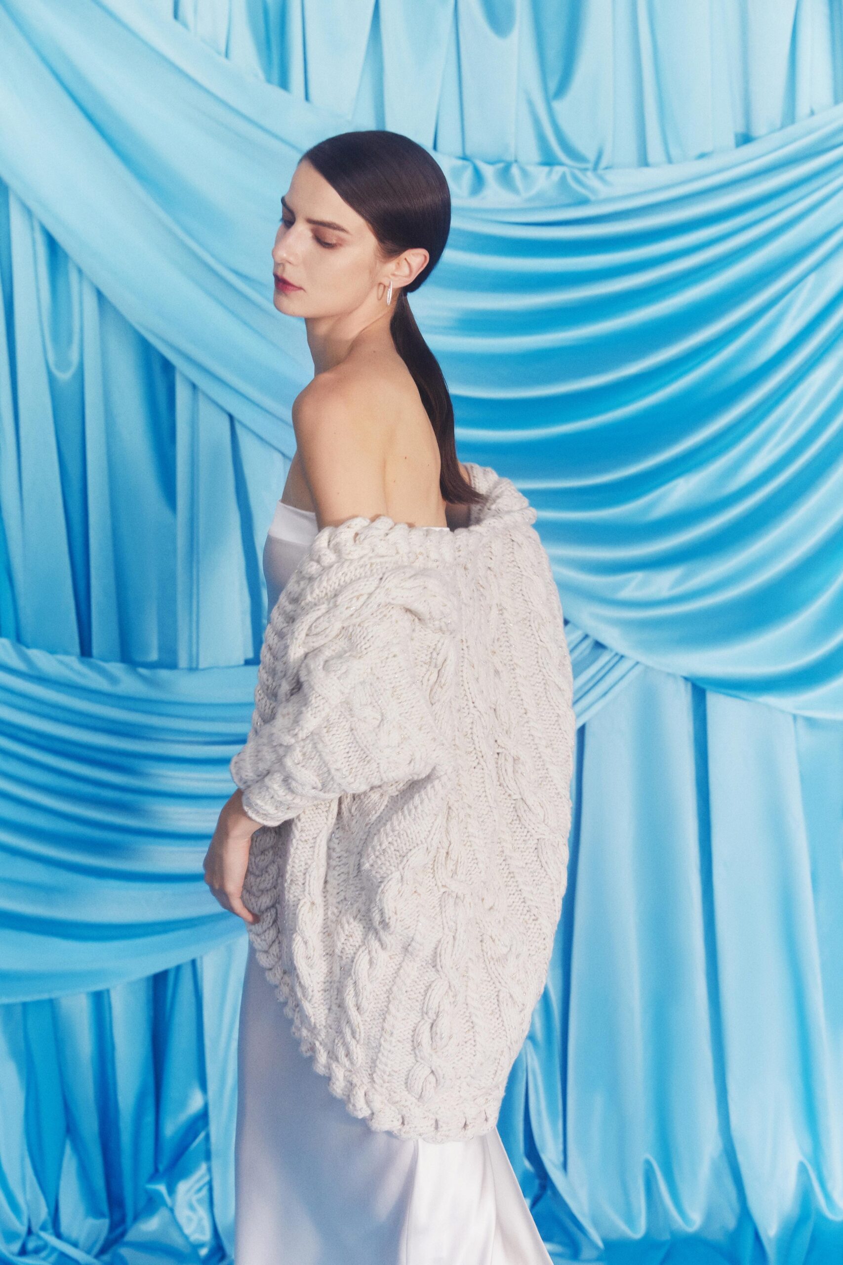 white wool sweater and gown