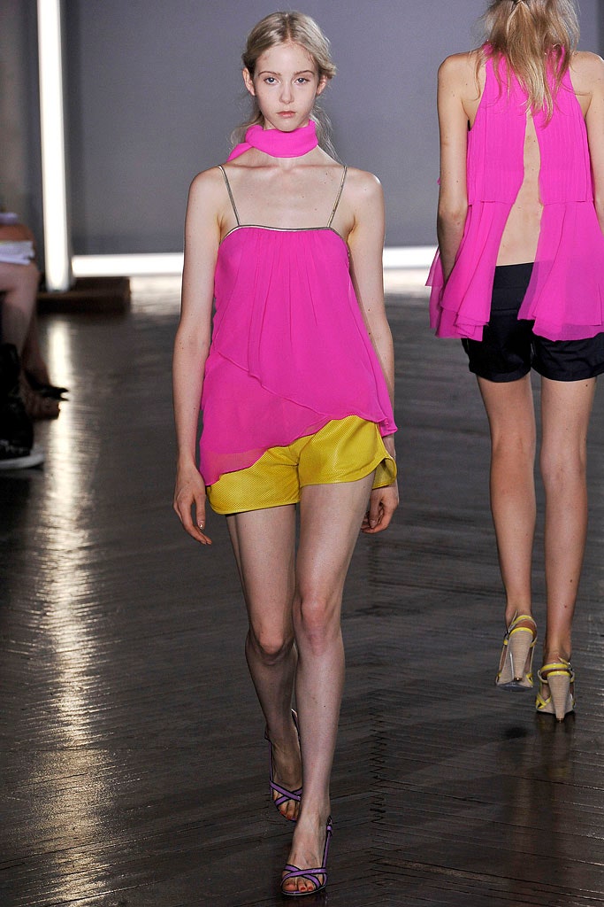 pink sleeveless high-neck relaxed draped flowing top