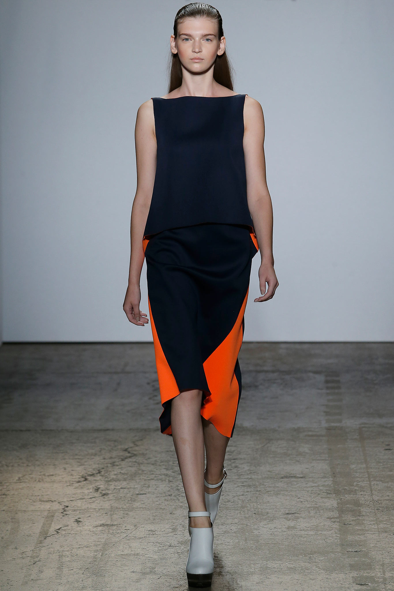 navy and orange color-blocked outfit