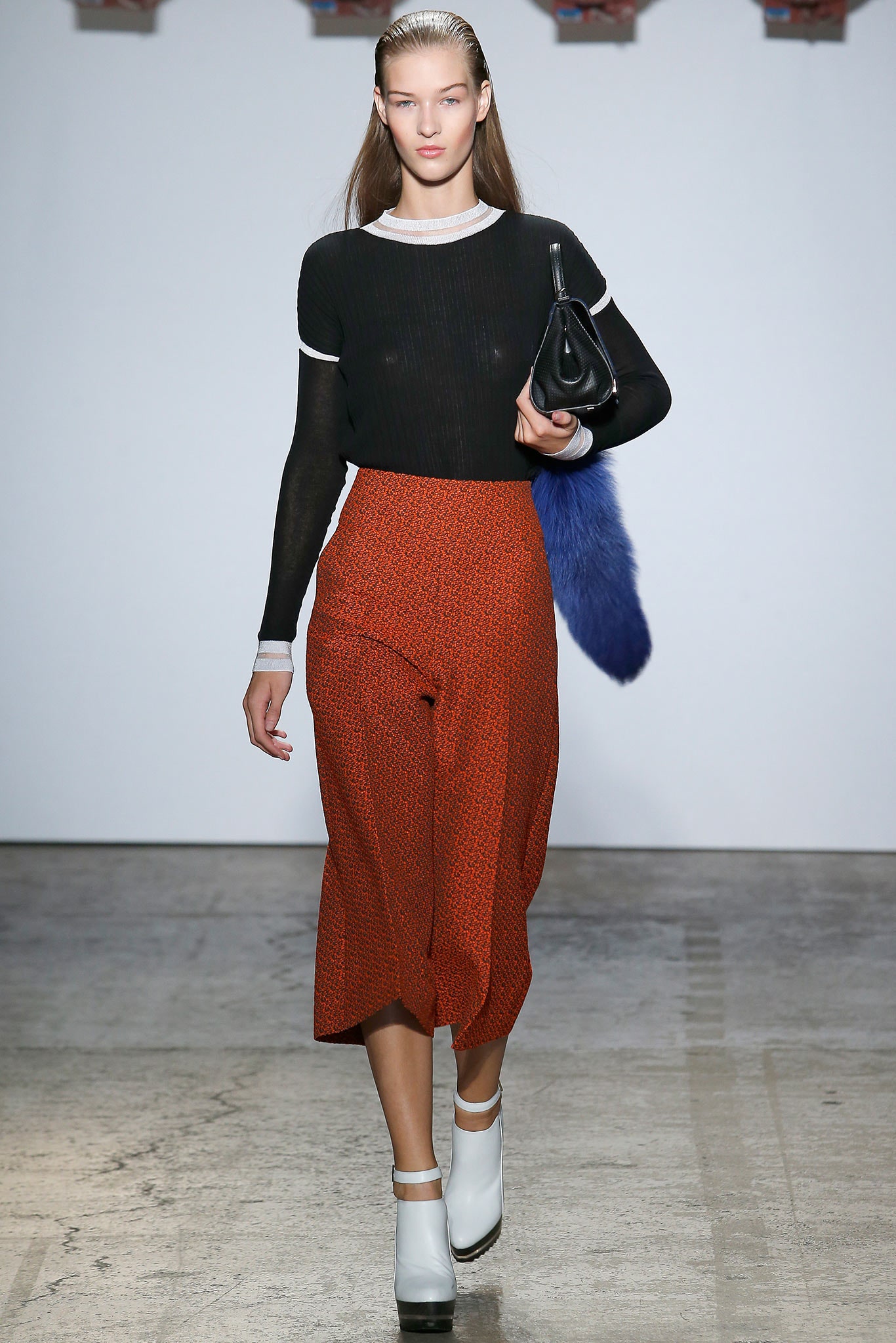 black fitted top with red skirt