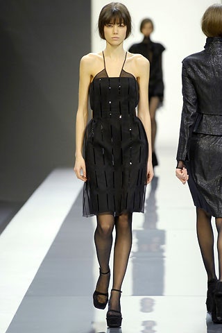 black pleated sleeveless dress