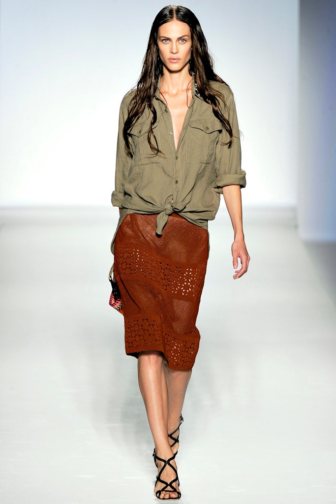 green relaxed shirt and brown leather skirt