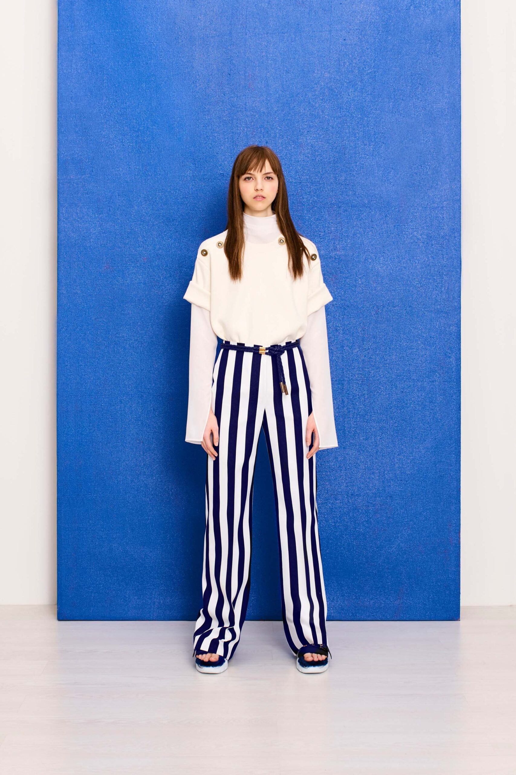 white relaxed top with striped pants