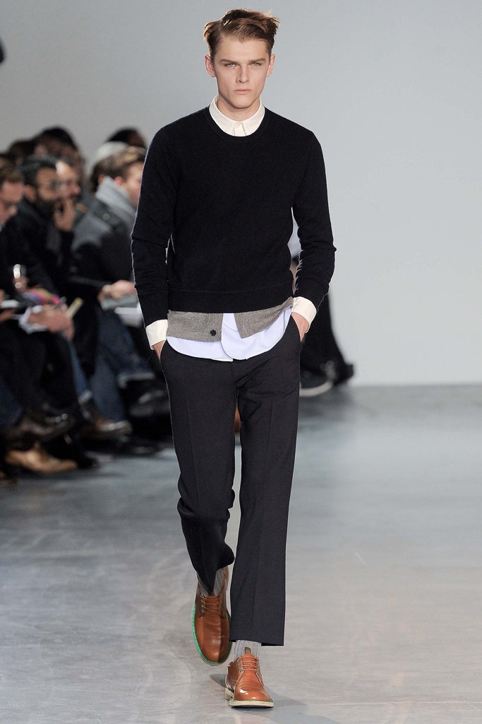 black wool fitted sweater with gray pants