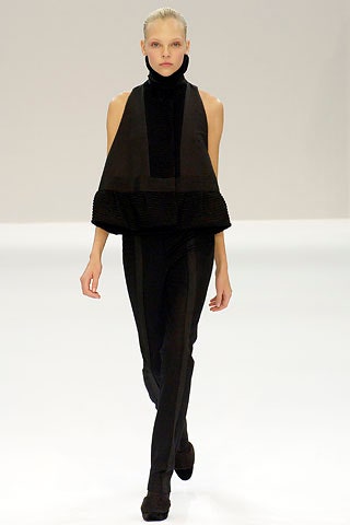black velvet sleeveless high-neck fitted pleated top