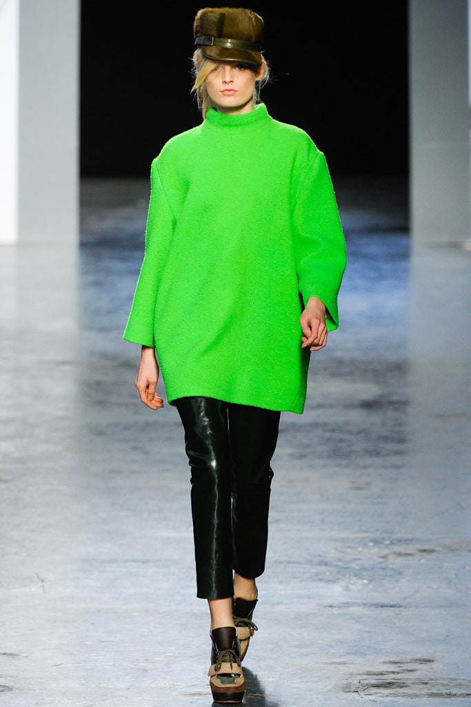 oversized green wool top with black pants
