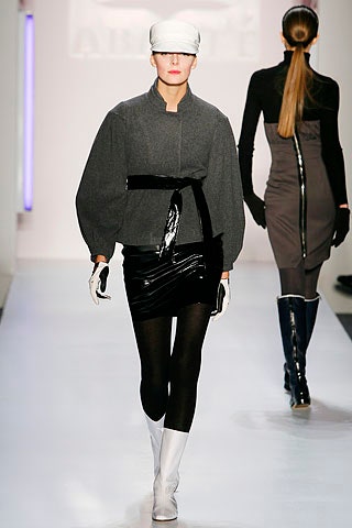 gray wool fitted jacket with black vinyl skirt