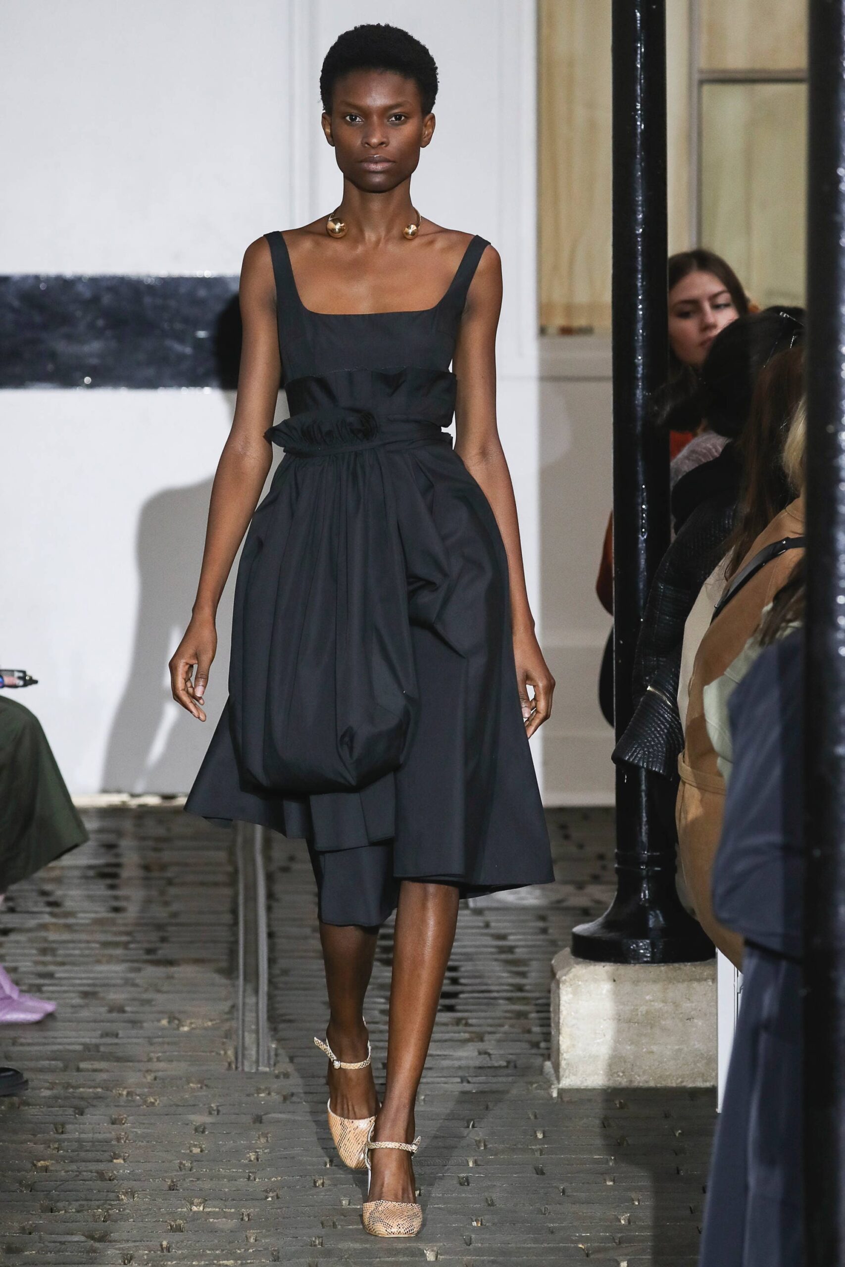 black fitted sleeveless dress