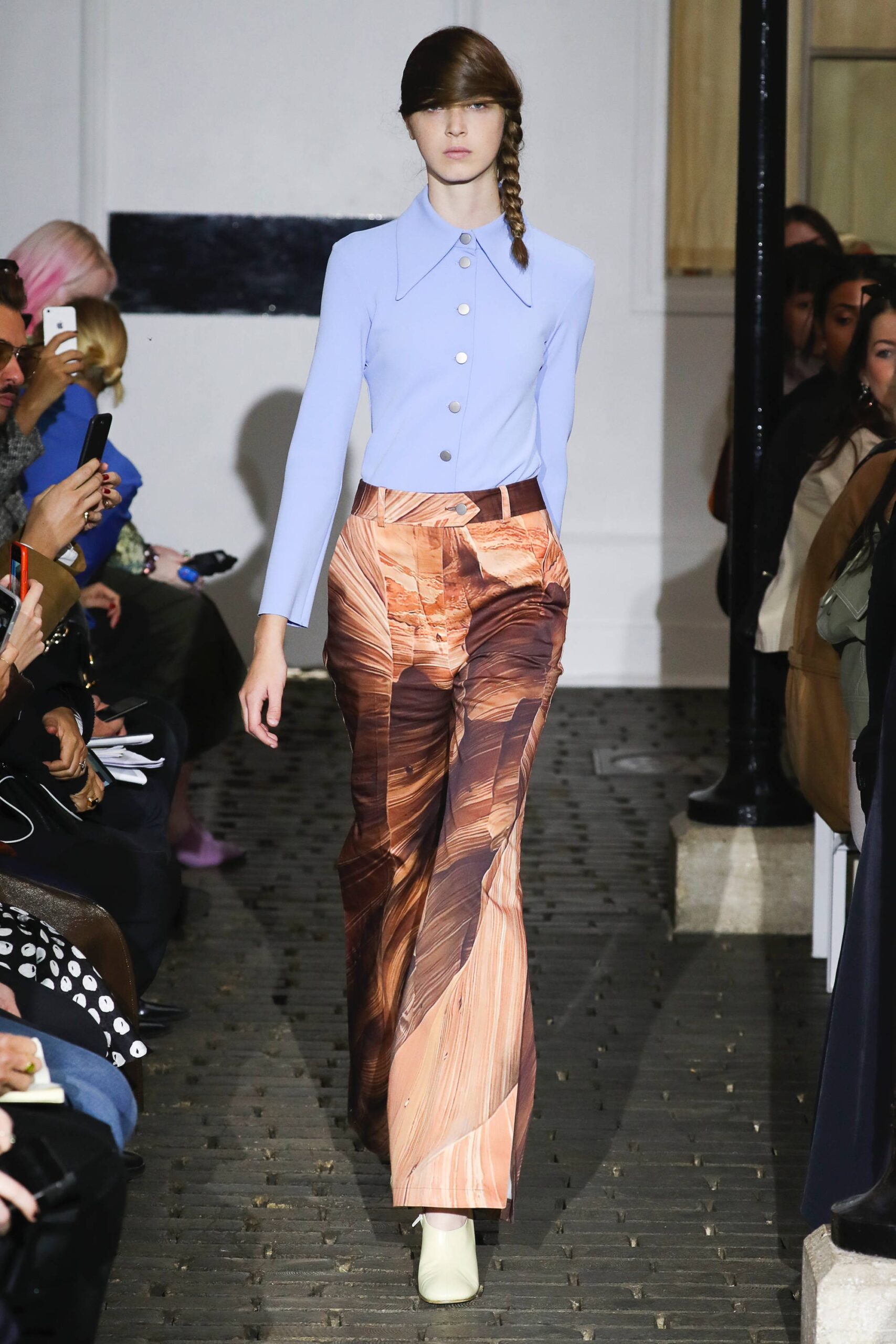 blue fitted top with multi wide-leg pants